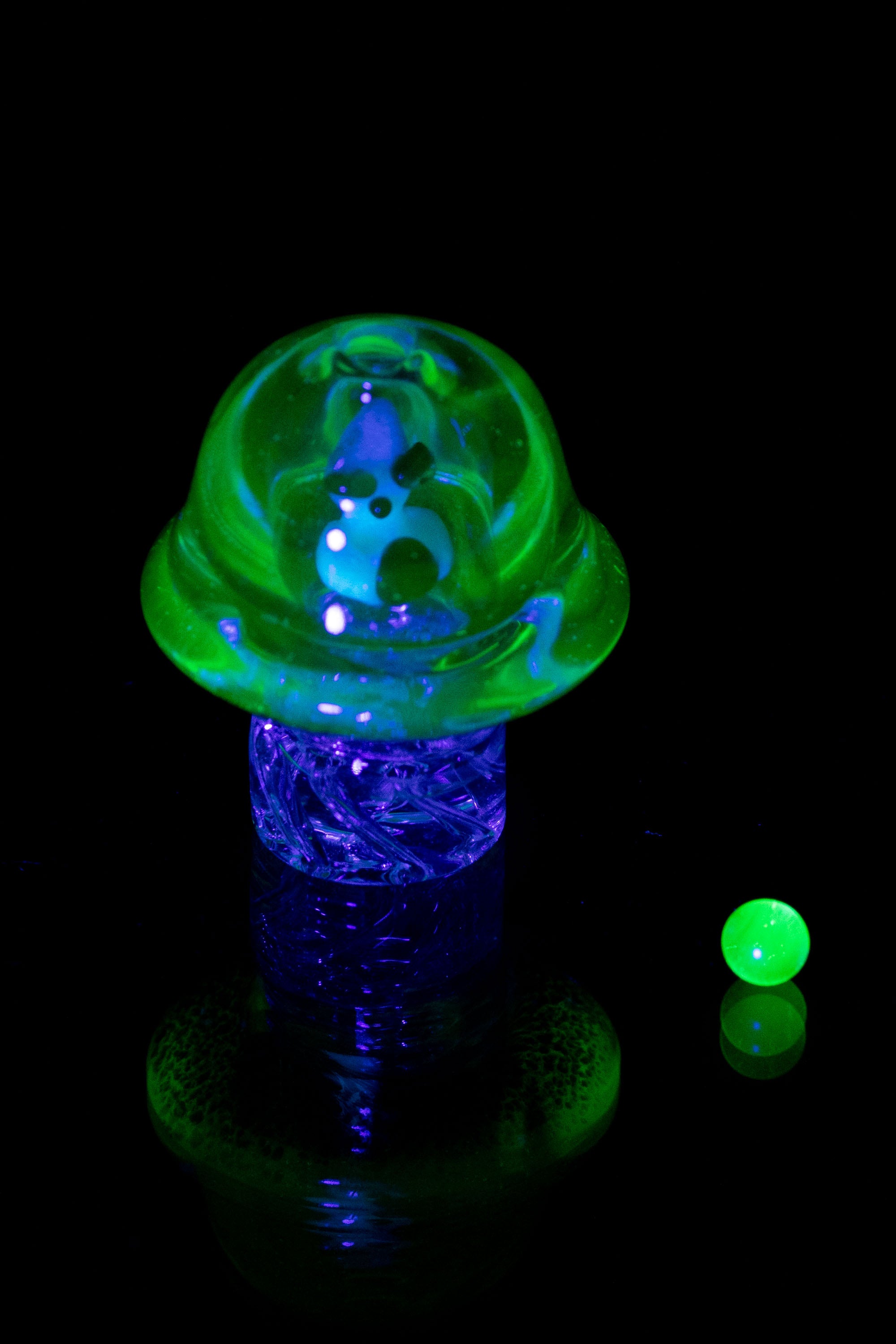 Empire Glassworks UV Illuminati Martian Spinner Cap - A Magical Dabbing Accessory