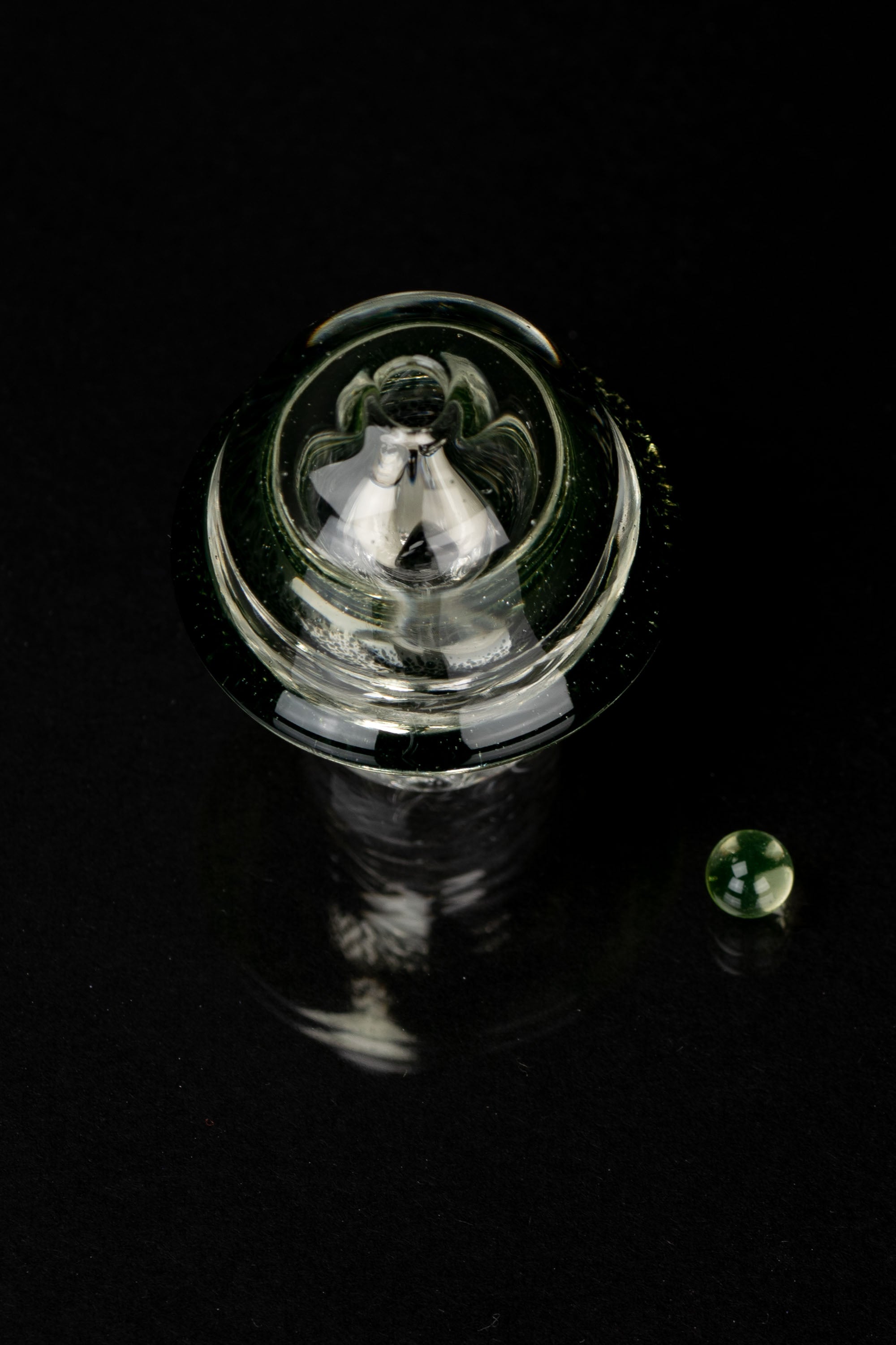 Empire Glassworks UV Illuminati Martian Spinner Cap - A Magical Dabbing Accessory