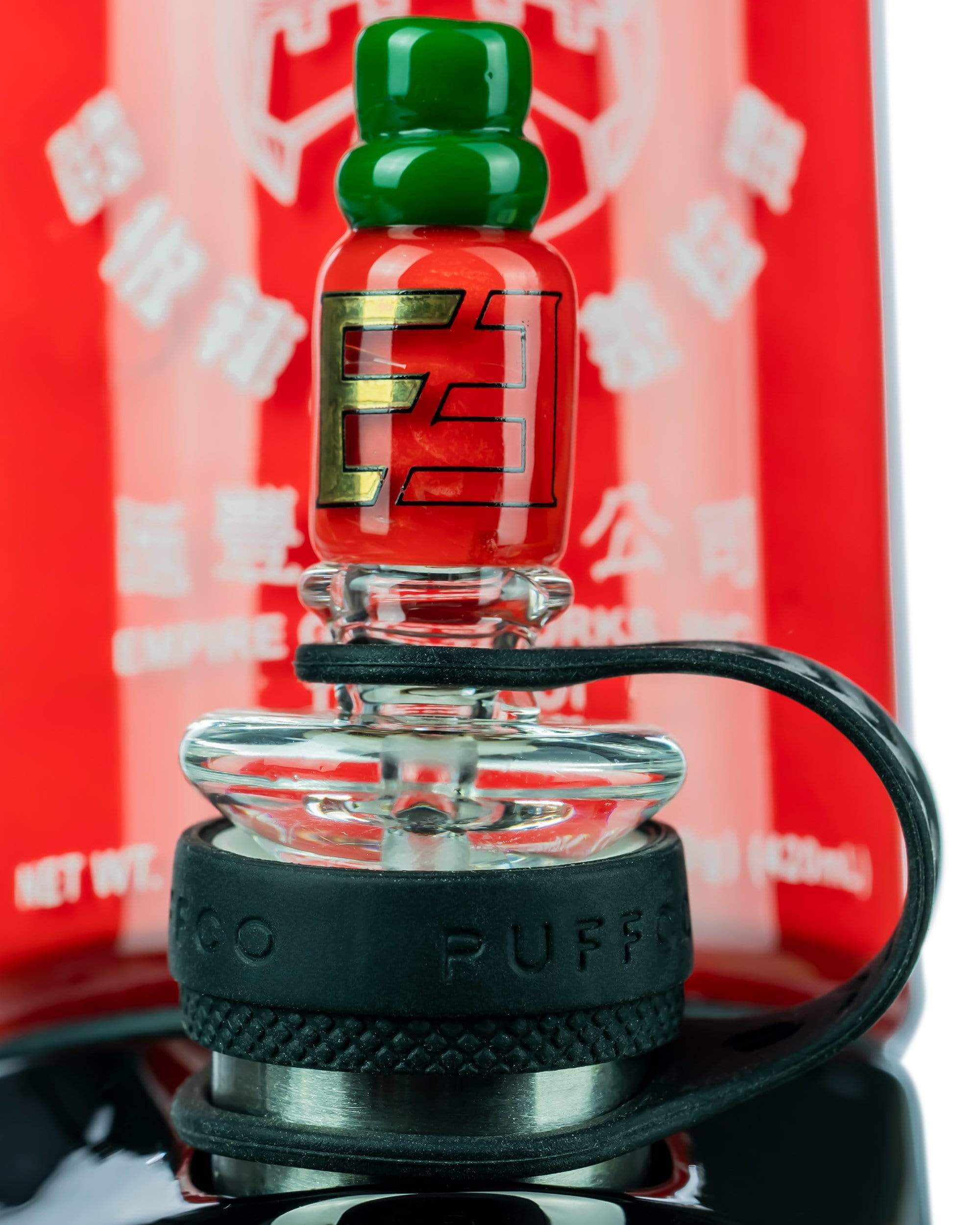 Empire Glassworks Sriracha Themed Carb Cap: A Must-Have for Puffco Peak Users